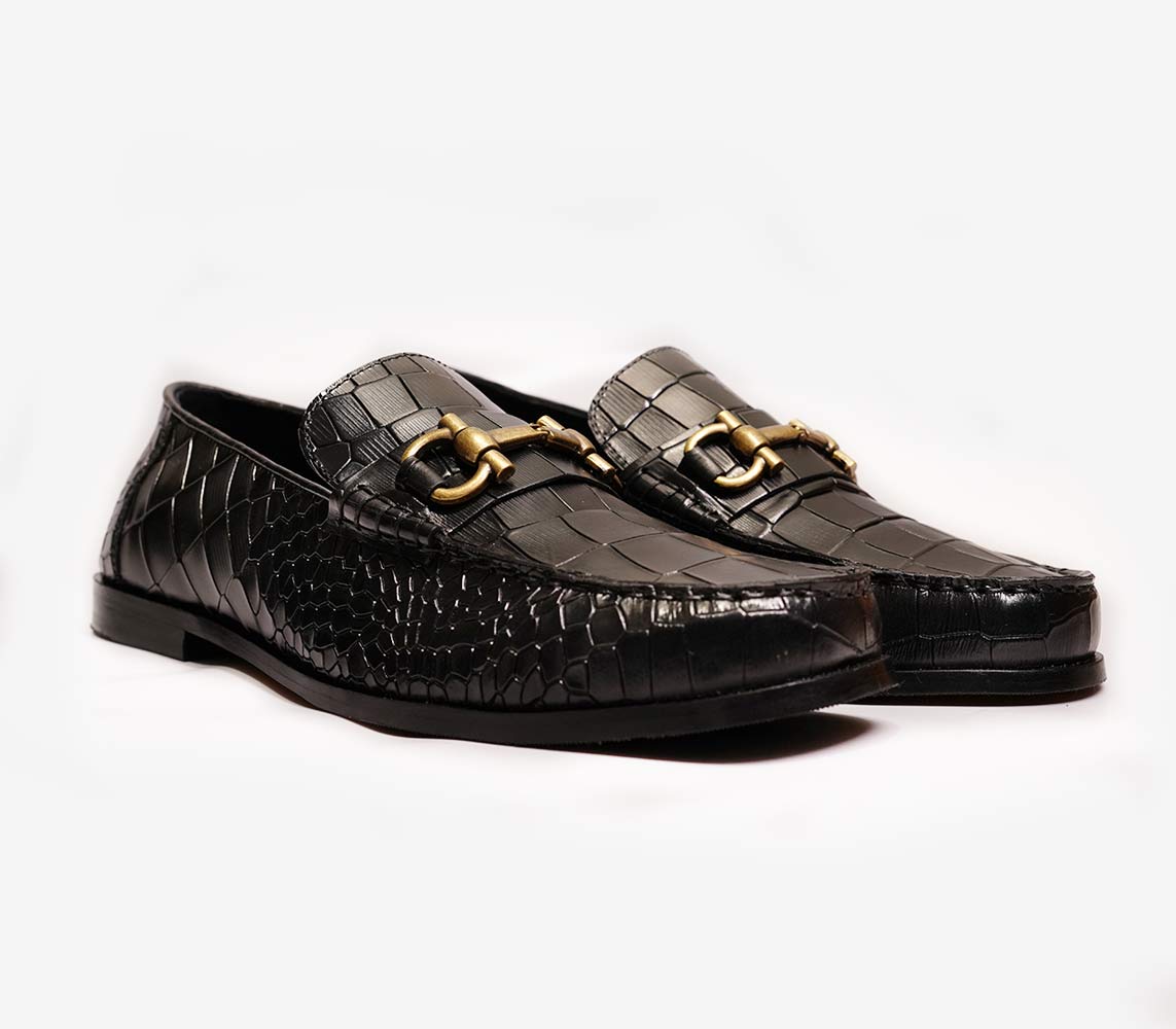 Black leather loafers with buckle